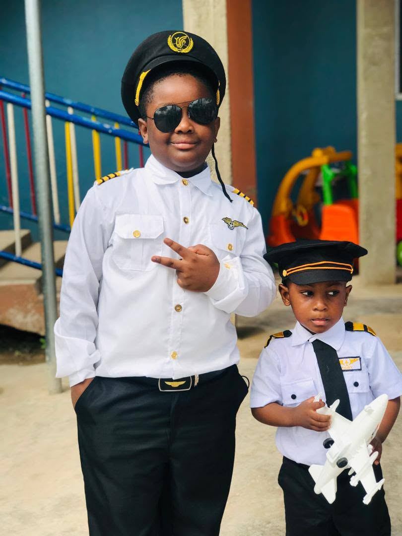 Two Regina Mundi pupils dressed as pilots